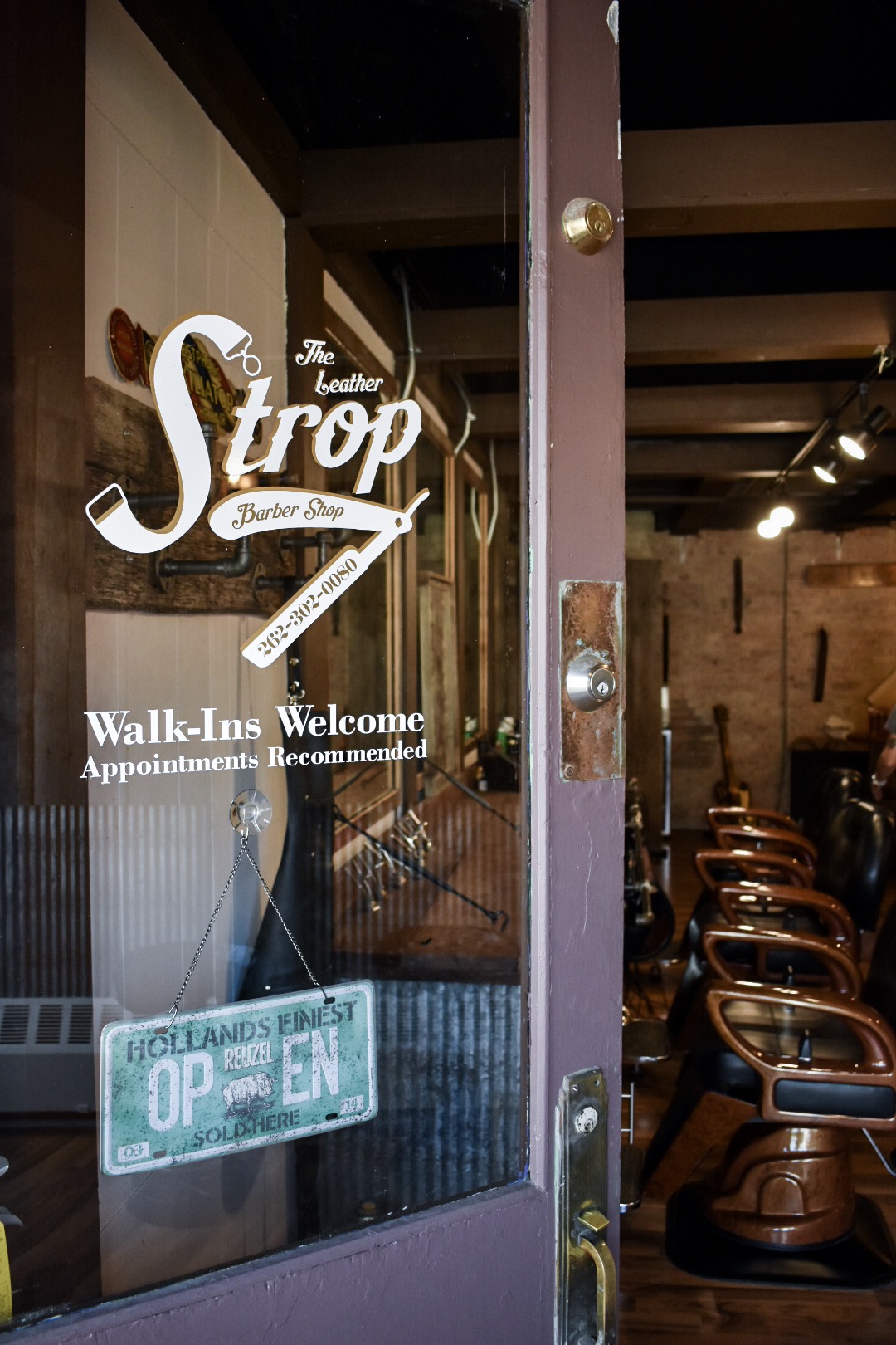 Men's fade haircut The Leather Strop Waukesha